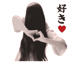 AN IMAGE OF SADAKO FROM THE RING HOLDING UP HER HANDS IN A HEART. THE TEXT NEXT TO HER READS 'I LIKE IT' IN JAPANESE.
